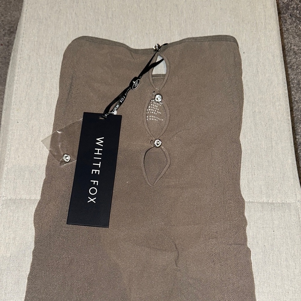 white fox strapless dress. ONE SIZE FITS MOST!!! looks tiny, has stretch.